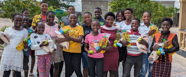 A Christmas gift of food and clothes for our Learning Centre Children by Baraka Community Partnerships fundraising photo 2