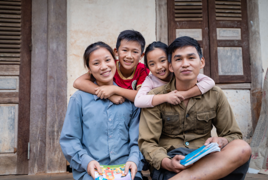 Orphans into foster families in Cambodia by Care for Children UK cover photo